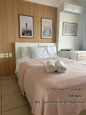 Uma cama ou camas num quarto em Férias com Vista Mar - Beach Village Residence por Casamarinn