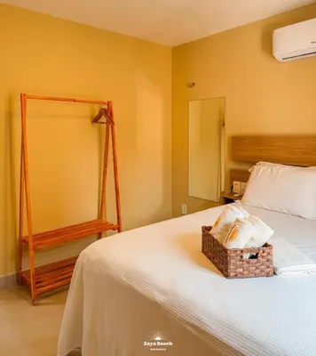 Uma cama ou camas num quarto em Zaya Beach Residence