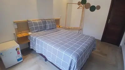 Uma cama ou camas num quarto em Pousada Solarium
