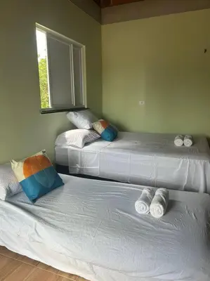 Uma cama ou camas num quarto em Apartamento 200m da lagoa