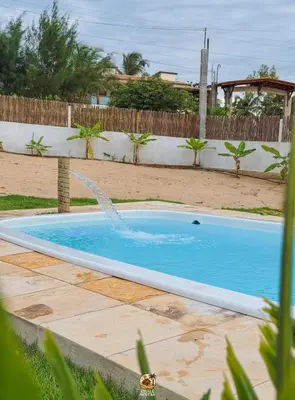 A piscina em ou perto de Moitas chalés