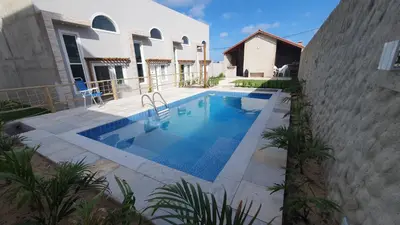 A piscina em ou perto de VidaBela Lofts Cumbuco CE