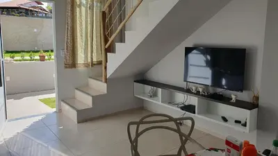 Uma televisão e/ou sistema de entretenimento em VidaBela Lofts Cumbuco CE