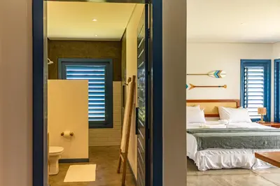 Uma cama ou camas num quarto em Casa Pipa - Pontal de Maceió