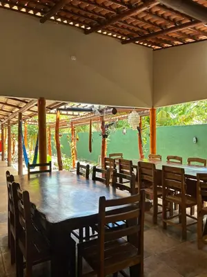 Um restaurante ou outro lugar para comer em Pousada Imperio dos Bambus