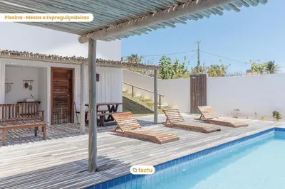 A piscina em ou perto de Apto térreo no Pontal do Maceió Tactu