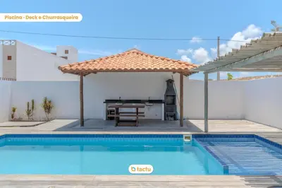 A piscina em ou perto de Apto térreo no Pontal do Maceió Tactu