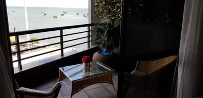 Uma área de estar em Iate Plaza, Flat na areia em Meireles