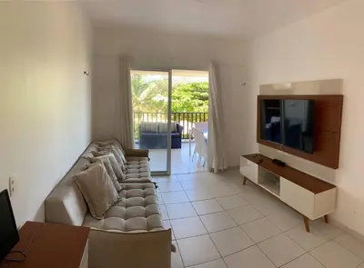 Uma televisão e/ou sistema de entretenimento em Ap Beach Park Living Porto das Dunas