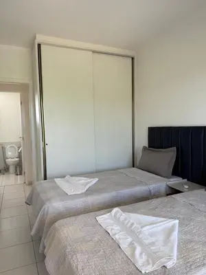 Uma cama ou camas num quarto em Ap Beach Park Living Porto das Dunas