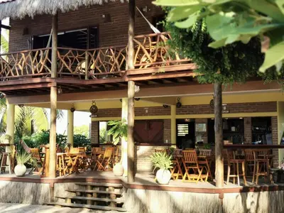 Um restaurante ou outro lugar para comer em Pousada Lacula