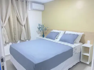 Uma cama ou camas num quarto em Meireles Compact Apartamento 500m da praia