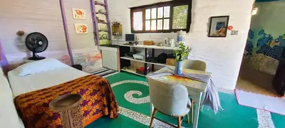 Uma cama ou camas num quarto em Portal Vida chalé na praia da Taiba