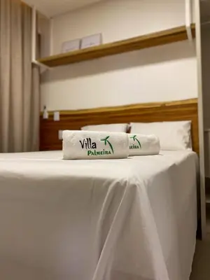 Uma cama ou camas num quarto em Villa Palmeira Flecheiras 101