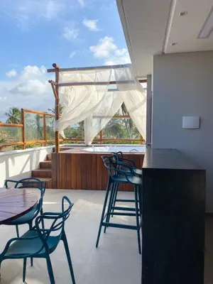 Uma varanda ou terraço em Villa Palmeira Flecheiras 201
