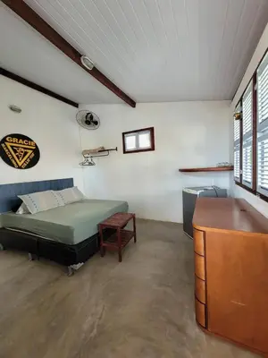 Uma cama ou camas num quarto em Bungalow Suíte Independente em Uruaú