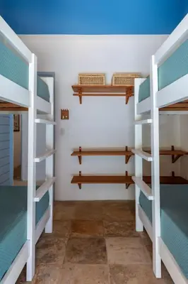Uma ou mais camas em beliche num quarto em Beachfront 7-bedroom Villa in Taiba - Kitesurfing Paradise