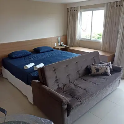 Uma cama ou camas num quarto em LUGAR INCRÍVEL - VG FUN PRAIA DO FUTUTO FORTALEZA