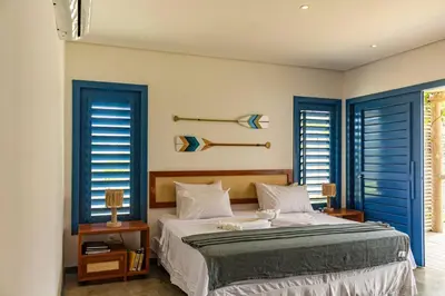 Uma cama ou camas num quarto em Casa de Praia Perfeita