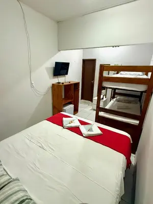 Uma cama ou camas num quarto em Pousada Praiana Jericoacora