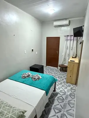 Uma cama ou camas num quarto em Pousada Praiana Jericoacora