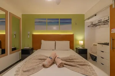 Uma cama ou camas num quarto em Eco Paradise #101 - Apê em Cumbuco por Carpediem