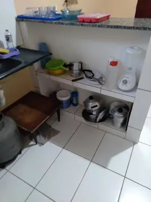 A cozinha ou kitchenette de kitinete - SALVATERRA GUARAMIRANGA