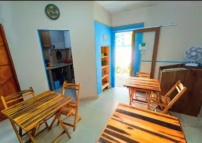 Uma televisão e/ou sistema de entretenimento em Casa Tuia Holiday Flat a 2km do centro e das falesias da Praia de Morro Branco