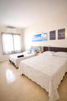 Uma cama ou camas num quarto em Apartamento completo Excelente localização Centro