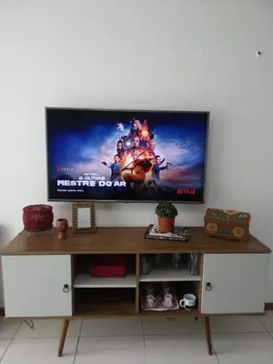 Uma televisão e/ou sistema de entretenimento em Apartamento Térreo no Catu Lake Resort Aquiraz