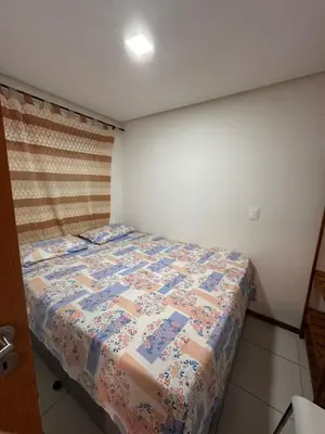 Uma cama ou camas num quarto em Apartamento Térreo no Catu Lake Resort Aquiraz