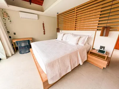 Uma cama ou camas num quarto em Poozendin Hotel de Charme