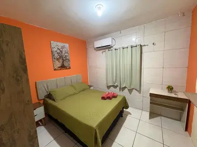 Uma cama ou camas num quarto em Apartamento completo e central! Casa Rute!