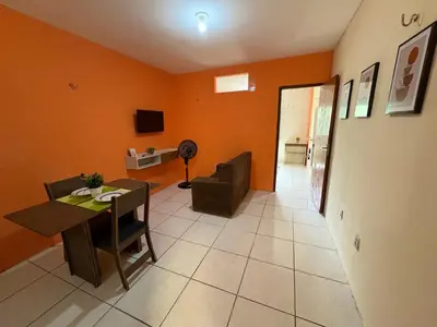 Uma televisão e/ou sistema de entretenimento em Apartamento completo e central! Casa Rute!