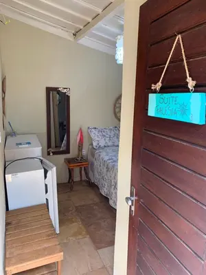 Uma cama ou camas num quarto em Mirante da Lua Residence
