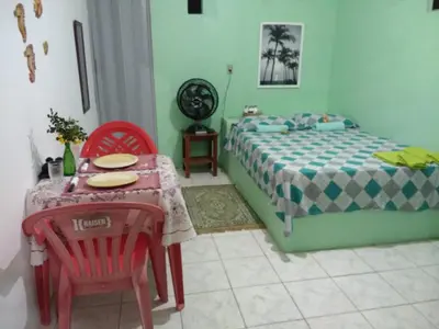 Uma cama ou camas num quarto em Casa Laranja