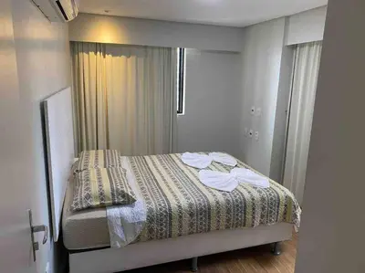 Uma cama ou camas num quarto em Ed Preamar 901 Próximo à Feirinha da Beira Mar