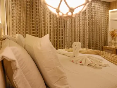 Uma cama ou camas num quarto em Bangalô Cobertura 4 suítes capacidade 14 pessoas