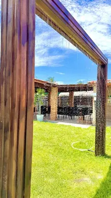 Um jardim no exterior de Casa de Praia Tibau-RN