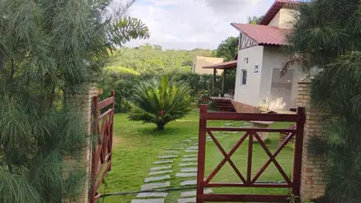 Um jardim no exterior de Reserva dos Ipês
