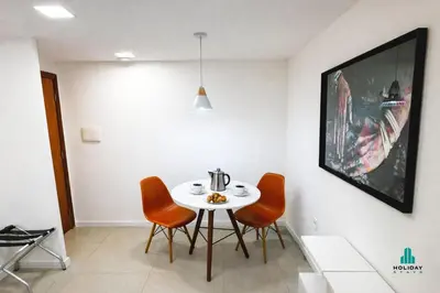 Uma área de estar em Deluxe Rooms by Holiday Stays