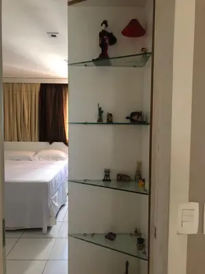 Uma cama ou camas num quarto em Homestay Fortaleza