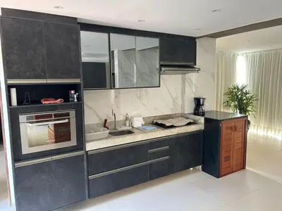 A cozinha ou kitchenette de Apartamento Chique frente ao mar