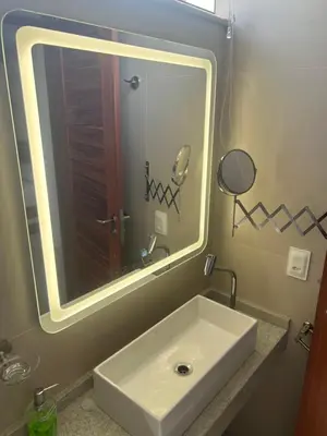 Uma casa de banho em Apartamento Chique frente ao mar