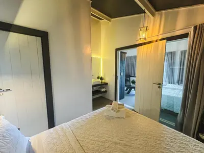 Uma cama ou camas num quarto em CHICO DINA POUSADA