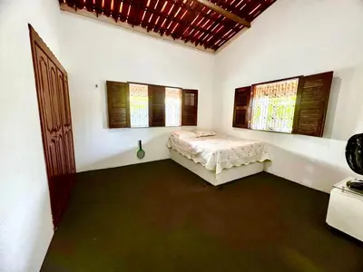 Uma cama ou camas num quarto em Toca do coelho