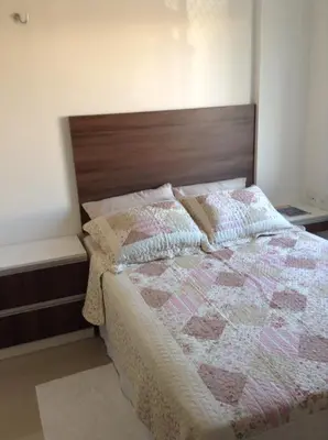 Uma cama ou camas num quarto em VG Fun Beach Front Apartamentos
