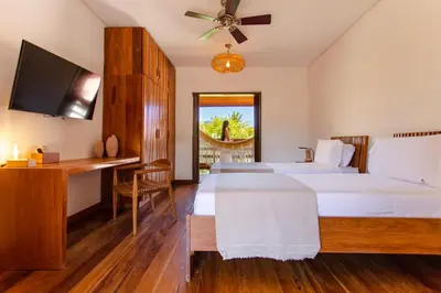 Uma cama ou camas num quarto em Vila Lion - Aldeia Jericoacoara Group
