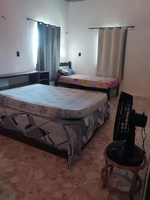 Uma cama ou camas num quarto em Casa de Praia no Iguape Ce.