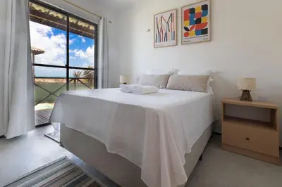 Uma cama ou camas num quarto em Beachfront Duplex #A10 em Barro Preto by Carpediem
